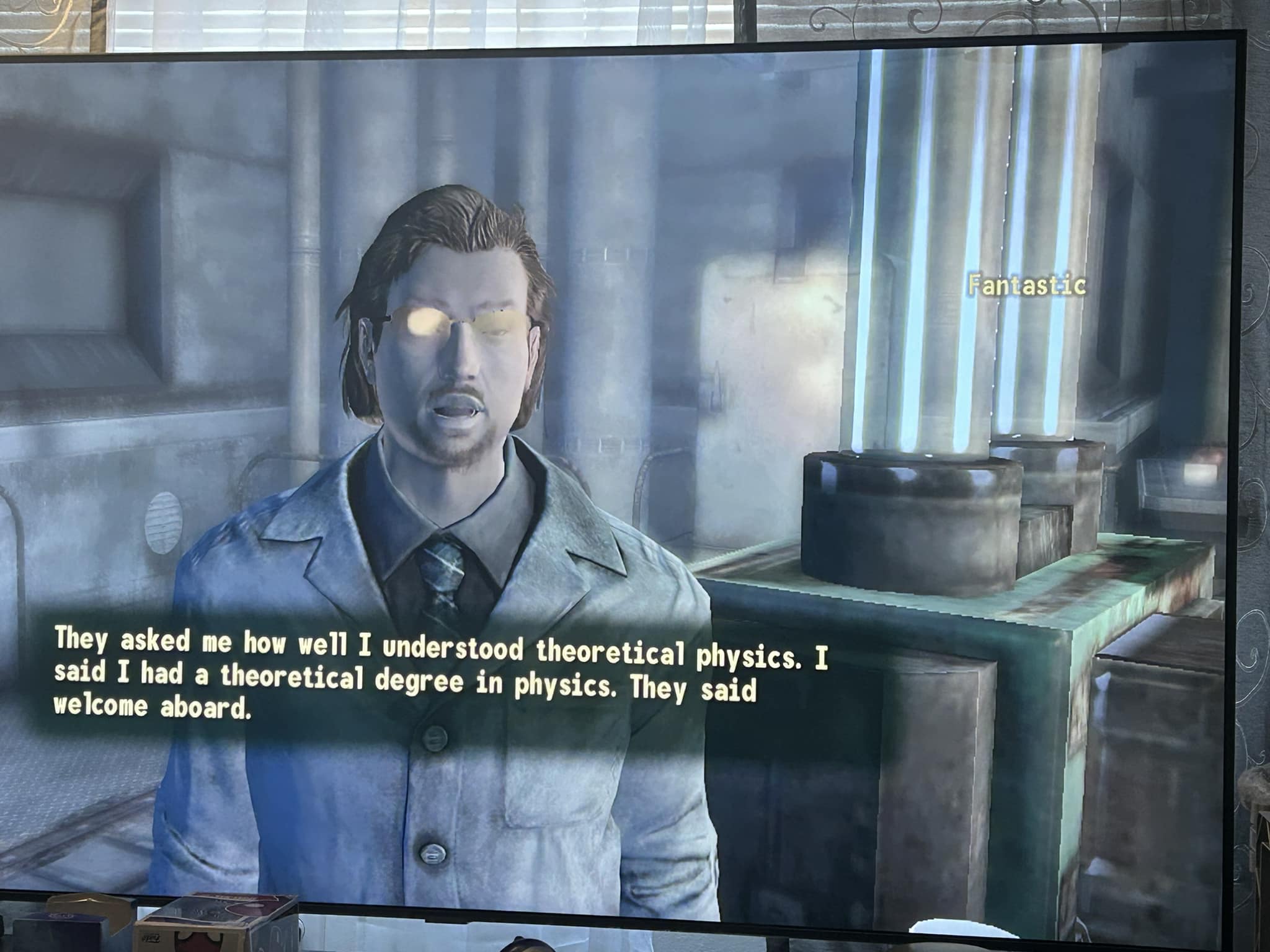 The meme is a screenshot of a character from the video game "Fallout 4" named "Doctor Amari" (also known as "Amari"). The character is saying "They asked me how I understood theoretical physics. I said I had a theoretical degree in physics. They said welcome aboard." The meme is likely referencing the absurdity of the character's response to a question about his understanding of theoretical physics, implying that he has a degree in the subject, but it's actually a joke about the character's lack of understanding.